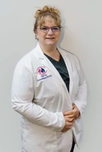 Full body photo of DeAnna Mahoney, DNP, APRN, FNP-BC